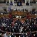 Greek lawmakers take the oath during a swearing in ceremony at the Parliament in Athens on Monday, July 3, 2023.
