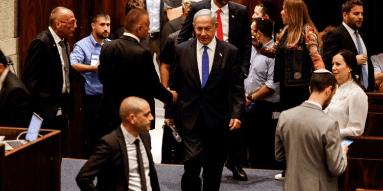 Israel’s Knesset Approves Bill Which Forms Key Part Of Netanyahu's Judicial Overhaul Plan 1 Israeli Prime Minister, Benjamin Netanyahu and lawmakers gather at the Knesset plenum to vote on a bill that would limit some Supreme Court power, in Jerusalem.