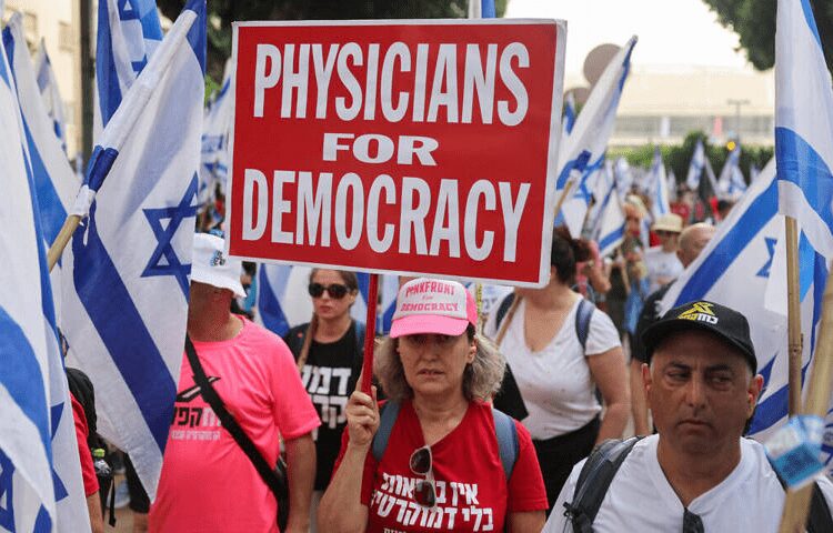 Doctors demonstrate against the judicial overhaul in Tel Aviv.