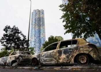 France: More Than 1,300 People Arrested After Fourth Night Of Unrests Over Nahel’s Death 1 Burnt cars are seen on Saturday morning after a night of clashes between protesters and police in Nanterre.