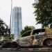 Burnt cars are seen on Saturday morning after a night of clashes between protesters and police in Nanterre.