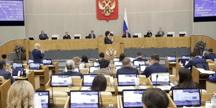 In this handout photo released by The State Duma, lawmakers attend a session at the State Duma, the Lower House of the Russian Parliament in Moscow, Russia, Friday, July 14, 2023.