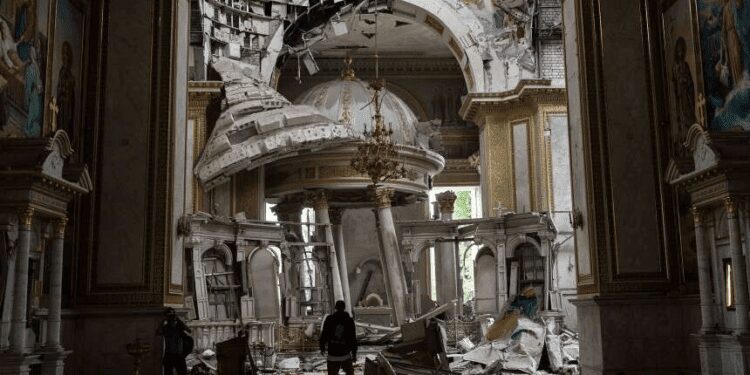 Russia Launches Another Attack On Odesa, Spaso-Preobrazhensky Cathedral Vandalized 1 Church personnel inspect damage inside the Transfiguration Cathedral in Odesa on Sunday, July, 23, 2023.