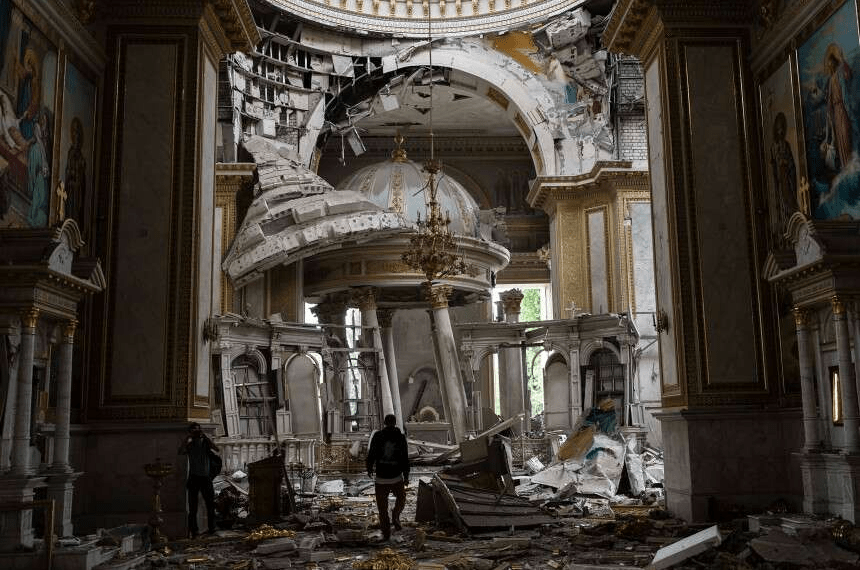 Church personnel inspect damage inside the Transfiguration Cathedral in Odesa on Sunday, July, 23, 2023.