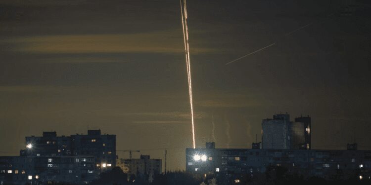 Russian rockets are launched against Ukraine from Russia's Belgorod region, seen from Kharkiv