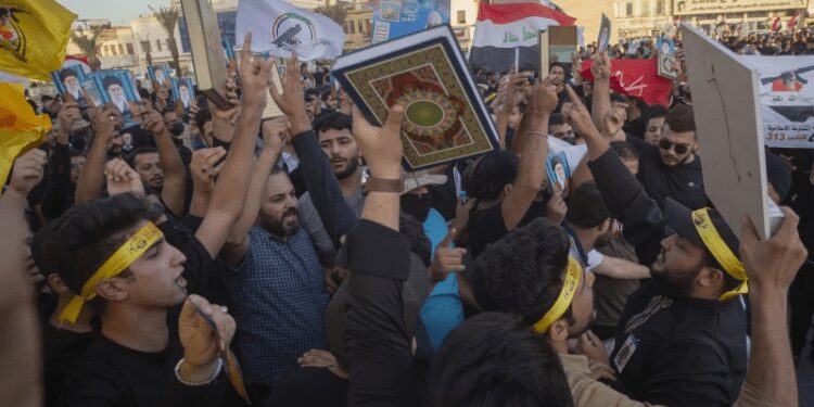Muslim-Majority Nations React To Quran Desecration Incident In Sweden 1 Iraqis raise copies of the Quran, Muslims’ holy book, during a protest in Tahrir Square in Baghdad, Iraq.