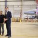 Dutch Government To Deliver Initial Eighteen F-16 Jets To Ukraine 11 This photograph taken and released by the Ukrainian Presidential Press Service on 20 August 2023, shows Ukraine's President Volodymyr Zelenskyy (C) and Dutch Prime Minister Mark Rutte (R) standing next to a F-16 fighter jet in the hangar at the Eindhoven Military Air Base.