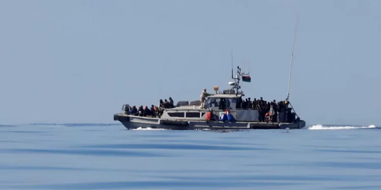 At least six people are killed and 50 are saved as a small boat attempting to cross the English Channel capsizes.