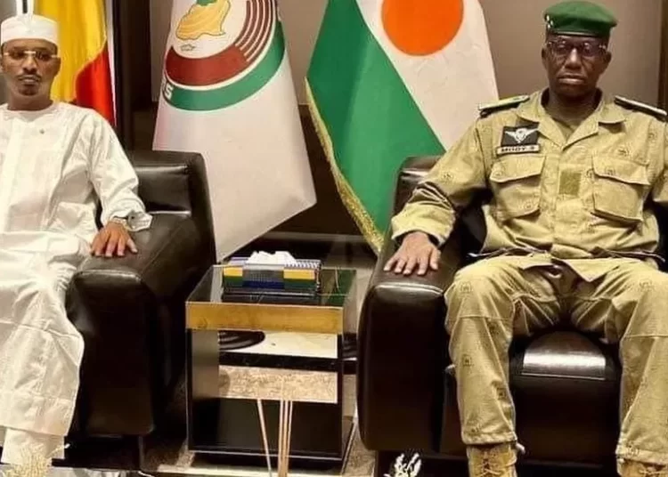 Junta deputy leader Gen Salifou Mody (R) Chad's president (L).