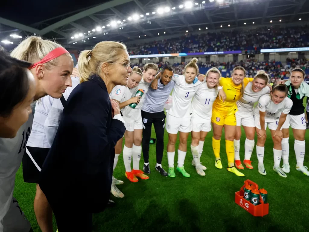 Sarina Wiegman England Womens National Team Coach in Black Outfit speaking to her players after a match