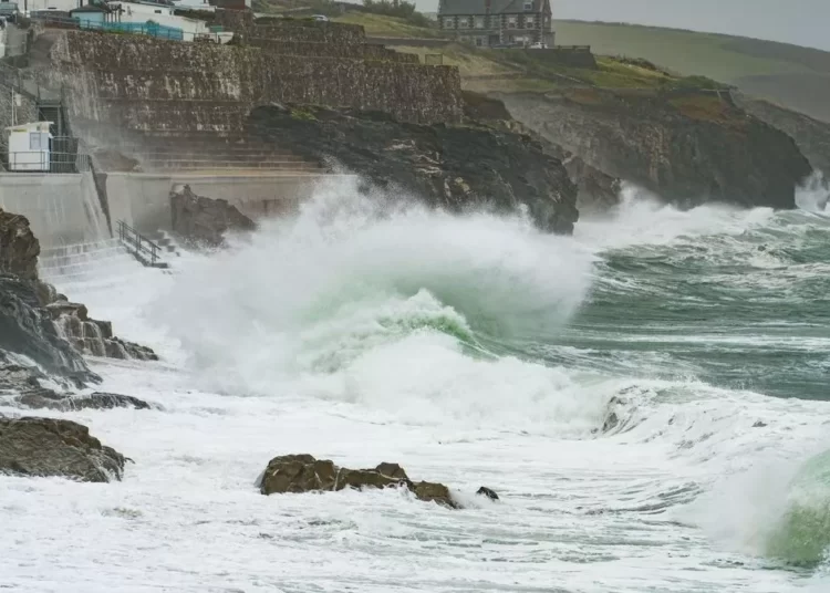 Heavy rain in Northern Ireland and violent storms in the south-wests of England and Wales are predicted amid amber alerts.