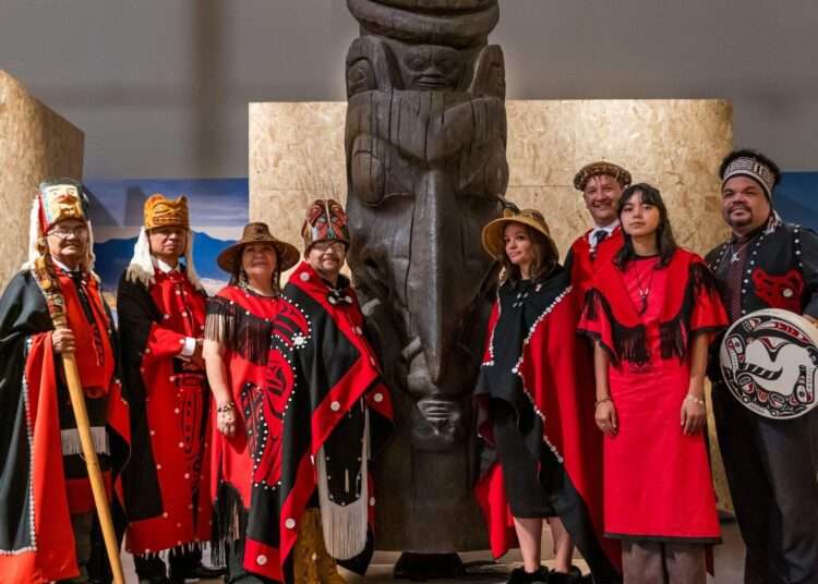 From Scotland To Canada, Totem Pole Goes Back To Its Original Home 1 The Nisga'a delegation at the National Museum of Scotland beside the 11-metre memorial pole.