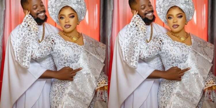 Nigerian crossdresser, Bobrisky flaunting a man who is likely to be her man