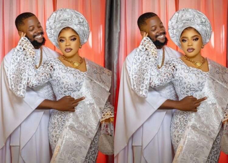 Nigerian crossdresser, Bobrisky flaunting a man who is likely to be her man