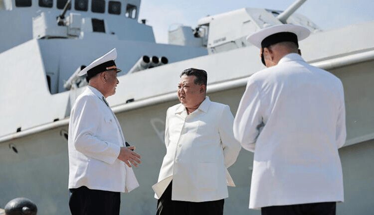 North Korea’s Kim Supervises Cruise Missile Test 1 Kim Jong Un speaking to members of the North Korean Navy ahead of a missile test, in photos released by state media.