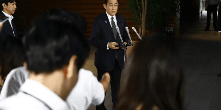 Japan To Commence Discharge Of Treated Radioactive Water From Fukushima Plant As Early As August 24 1 Japanese Prime Minister Fumio Kishida answers questions from journalists upon his arrival at the prime minister's office on Tuesday, Aug. 22, 2023, in Tokyo.