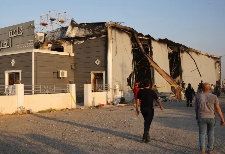 Three Days Of National Mourning Declared In Iraq 1 The remains of the al-Haitham event hall in Hamdaniyah after a fire broke out during a wedding reception, killing at least 100 people and injuring more than 150.