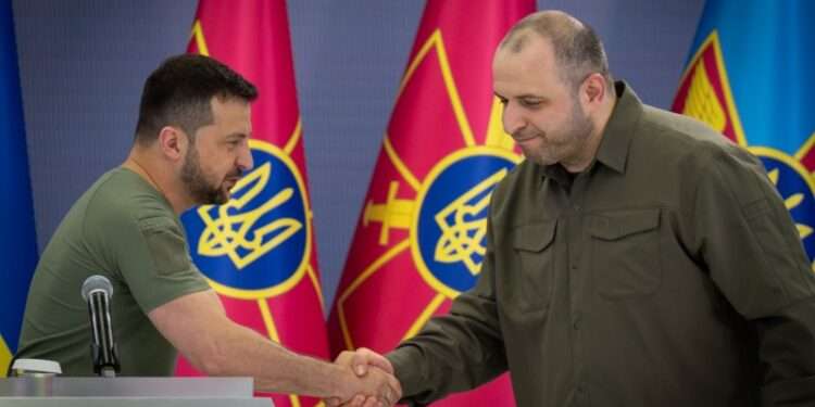 Ukrainian President, Volodymyr Zelenskyy shakes hands with Rustem Umerov, Ukraine's new Defense Minister.