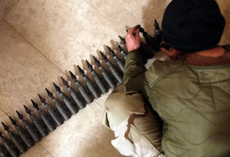 Russia Decries Plan To Provide Ukraine With Depleted Uranium Shells 1 A US soldier with 25mm rounds of depleted uranium ammunition at his base in Tikrit, Iraq, in 2004.