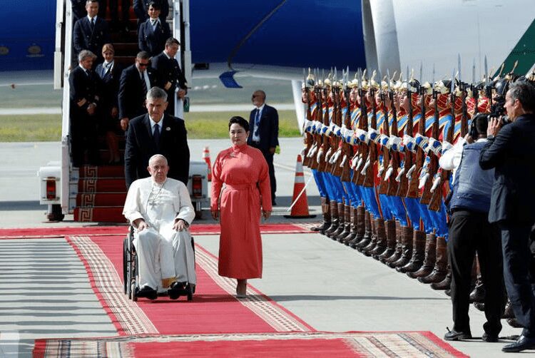 Pope Francis Arrives In Mongolia For 4-Day Visit 1 Pope Francis and Mongolia’s Foreign Minister, Battsetseg Batmunkh.