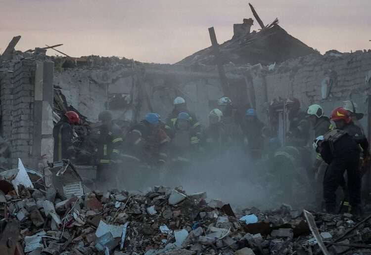 IRC Condemns Missile Attack In Hroza 1 Rescuers work at a site of a Russian military strike in the village of Hroza, in Kharkiv region, Ukraine.