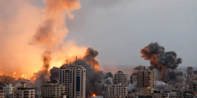 Israel Intensifies Attacks On Gaza Strip 1 Smoke and flames rise following Israeli strikes in Gaza.