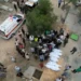 International Community Urged To Put People Before Politics 12 People bury the bodies of Palestinians killed in Israeli strikes at a cemetery, in the central Gaza Strip.