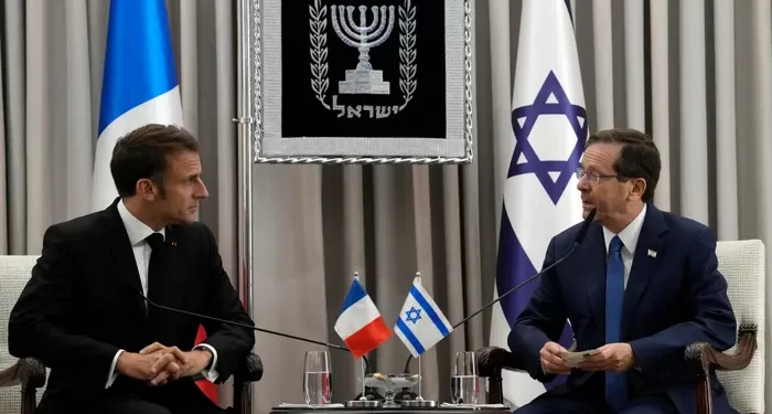 French President, Emmanuel Macron (L) meets with Israel's President, Isaac Herzog (R).