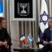French President, Emmanuel Macron (L) meets with Israel's President, Isaac Herzog (R).