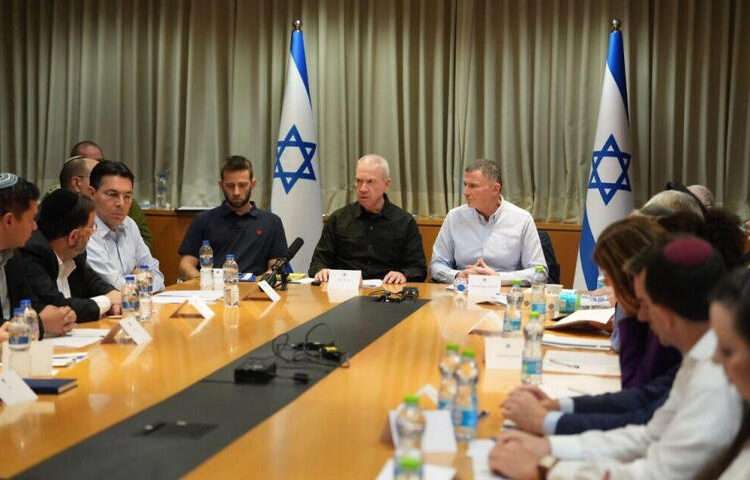 Israel's War Plans Revealed 1 Israeli Defense Minister Yoav Gallant, center, speaks at a Knesset Foreign Affairs and Defense Committee meeting in Tel Aviv, October 20, 2023.