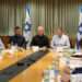 Israeli Defense Minister Yoav Gallant, center, speaks at a Knesset Foreign Affairs and Defense Committee meeting in Tel Aviv, October 20, 2023.