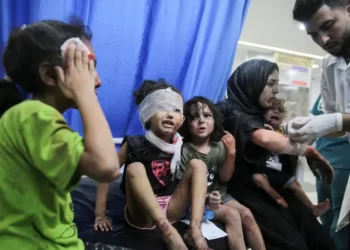 Palestinian children wounded in Israeli air raids are brought to al-Shifa Hospital in Gaza City.