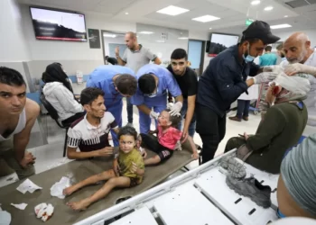 Palestinian children wounded in Israeli air attacks are brought to al-Shifa Hospital in Gaza City.