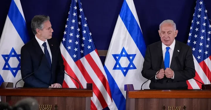 U.S. Secretary of State, Antony Blinken, left, and Israel's Prime Minister Benjamin Netanyahu make statements to the media inside The Kirya, which houses the Israeli Ministry of Defense, after their meeting in Tel Aviv, Thursday Oct. 12, 2023.