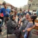 Palestinians react at the damages at a UN-run school sheltering displaced people, following an Israeli strike, in Jabalia.