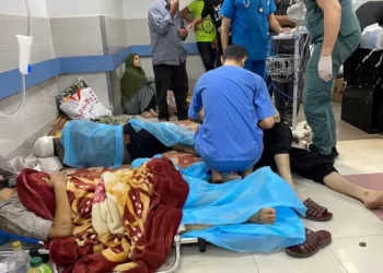 Palestinian wounded in an Israeli attack rest at Al-Shifa Hospital in Gaza City.