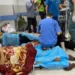 Palestinian wounded in an Israeli attack rest at Al-Shifa Hospital in Gaza City.