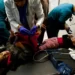 Palestinian children wounded in an Israeli strike are assisted at Nasser hospital in Khan Younis on Monday.