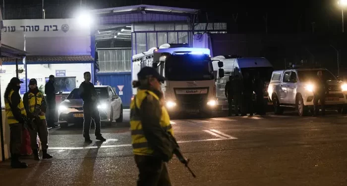 Israel Releases Palestinian Prisoners 1 An Israeli prison transport vehicle carries Palestinian prisoners released by Israel from Ofer military prison near Jerusalem.