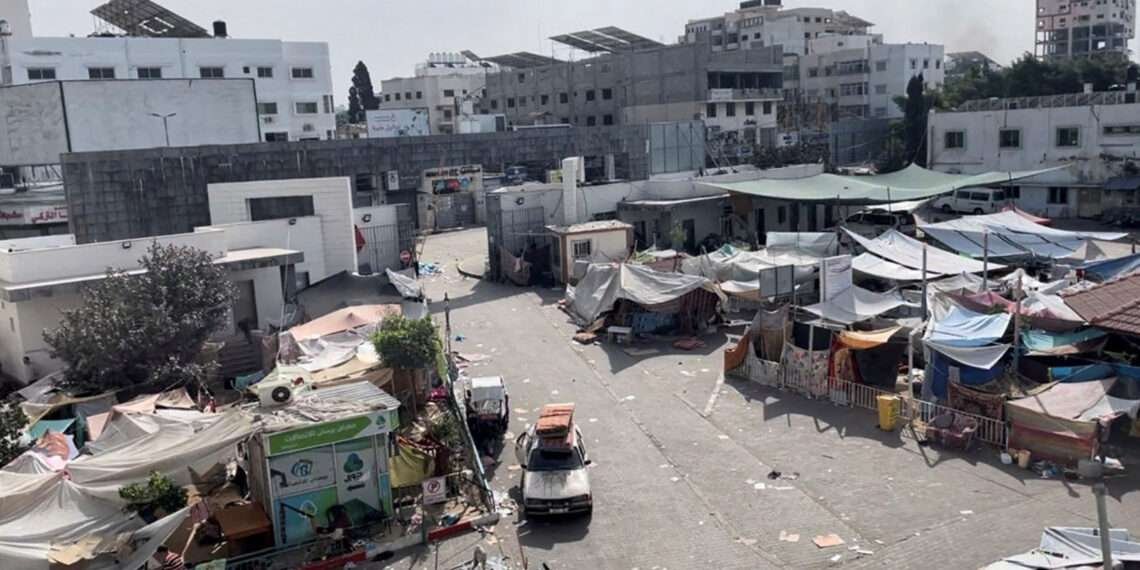 Tents and shelters used by displaced Palestinians stand at the yard of Al Shifa hospital during the Israeli ground operation around the hospital, in Gaza City November 12, 2023.