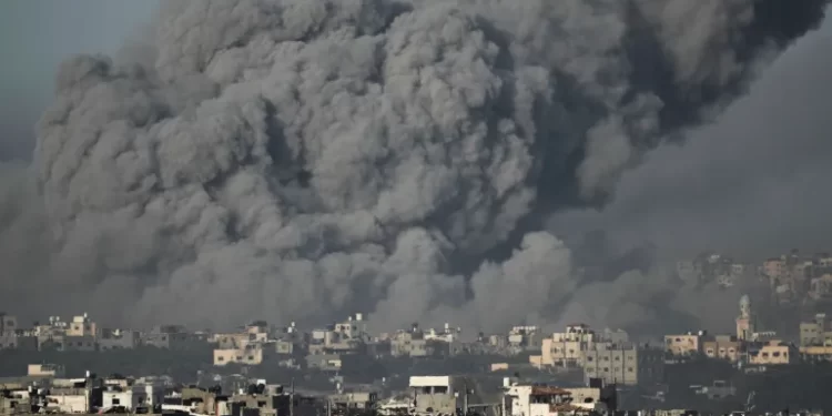 Strikes Rain On Gaza Amid News Of Truce 1 Smoke rises following an Israeli air strike in the Gaza Strip, as seen from southern Israel.