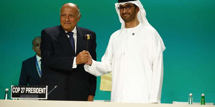 COP 28 Begins, Al Jaber Assumes Presidency 1 Egypt's Minister of Foreign Affairs Sameh Shoukry hands over the ceremonial gavel to COP28 President Sultan Al Jaber in Dubai.
