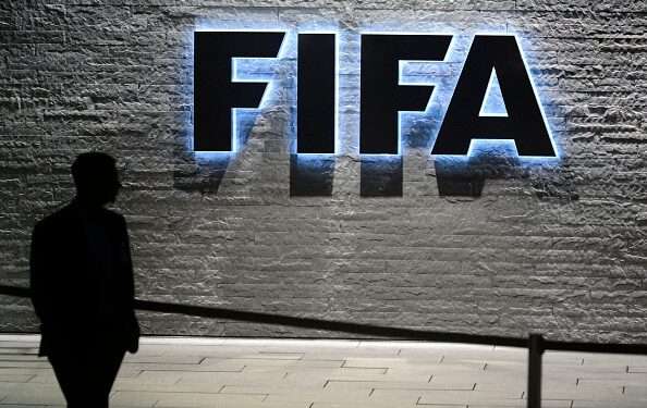 FIFA's Inaction Over Israeli Attacks In Gaza Criticized 1 A FIFA employee walks past a sign of the FIFA at the headquarters on December 3, 2015 in Zurich.