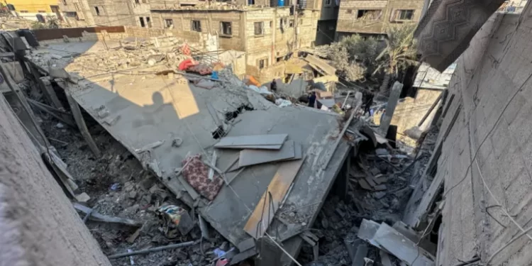 A house lies in ruins following an Israeli strike after a temporary truce between Hamas and Israel expired, in Khan Younis in the southern Gaza Strip.