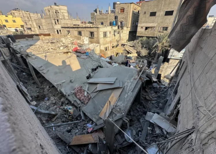 A house lies in ruins following an Israeli strike after a temporary truce between Hamas and Israel expired, in Khan Younis in the southern Gaza Strip.