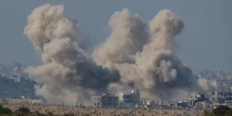 Smoke rises in Gaza following an Israeli strike as seen from southern Israel.