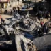 Palestinians gather at the site of an Israeli strike in Rafah, in the southern Gaza Strip.