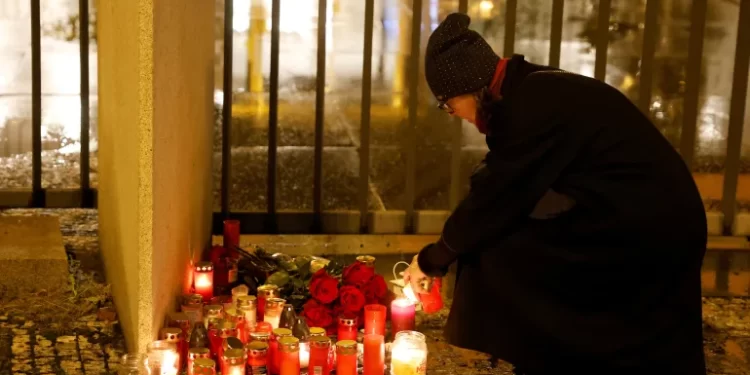 Day Of Mourning Declared After Prague Mass Shooting Incident 1 People began lighting candles outside the university for those killed in the shooting
