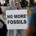 COP28: New Global Stocktake Text Criticized 11 Activists attend a protest at the COP climate conference.