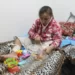 2023 Labelled As "Year Of Genocide" Against Palestinian Children 11 A Palestinian girl whose limb was amputated after being wounded in an Israeli strike receives treatment at the European Hospital in Rafah.
